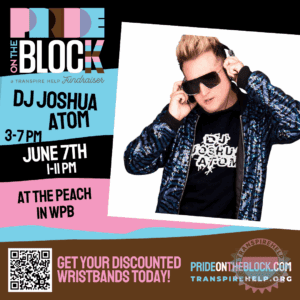 DJ Joshua Atom in sequins and sunglasses, mixing live at the turntables