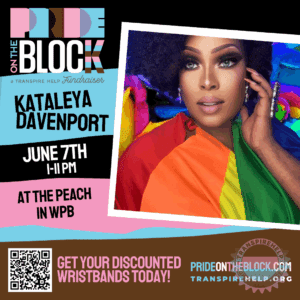 Kataleya Davenport in glam makeup and afro curls draped in a rainbow pride flag