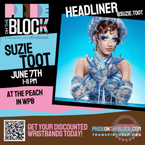Suzie Toot in shimmering blue and silver sea-themed costume with dramatic makeup, headlining Pride on the Block 2025